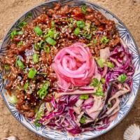 Bulgogi Ribeye Rice Bowl · Thinly sliced soy marinated beef over cucumbers, cabbage slaw, and your choice of base and s...