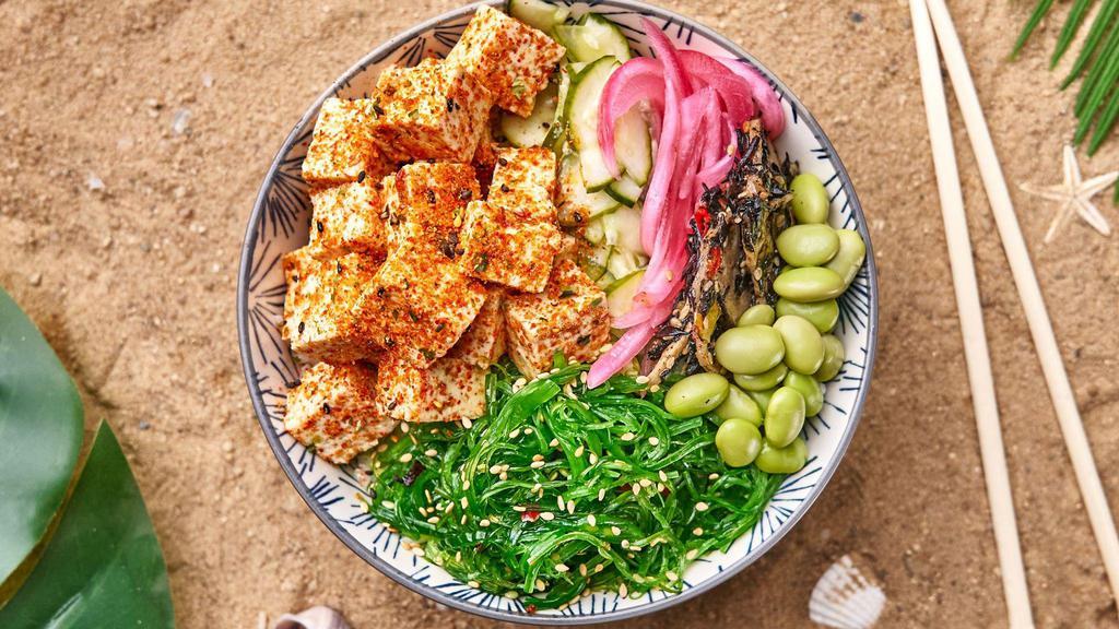 Chili Tofu (Vegan) · Tofu, edamame, mango, sesame seeds, avocado, burnt onion crisps, seaweed salad, and togarashi, with a Chili Ponzu and your choice of base