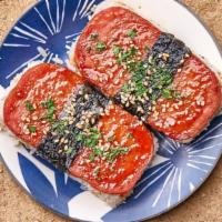Two Spam Musubi

  · A very popular Hawaiian snack and great for kids. Two pieces of grilled spam served as a sus...
