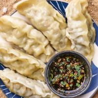 King Steamed Pork Gyoza · 5 pieces of our King size homemade steamed pork dumplings