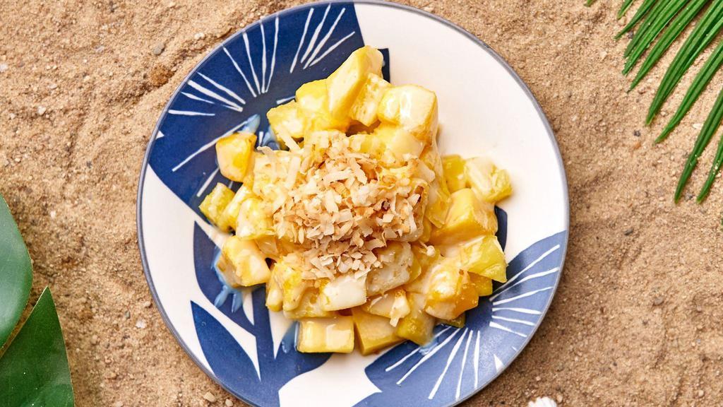 Pineapple Mango Salad  · Ripe mangoes and pineapples lightly dressed with condensed milk and coconut flakes.