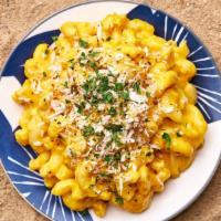 Brown Butter Mac & Cheese  · Macaroni prepared with freshly made cheese sauce, beurre noisette, and bread crumbs