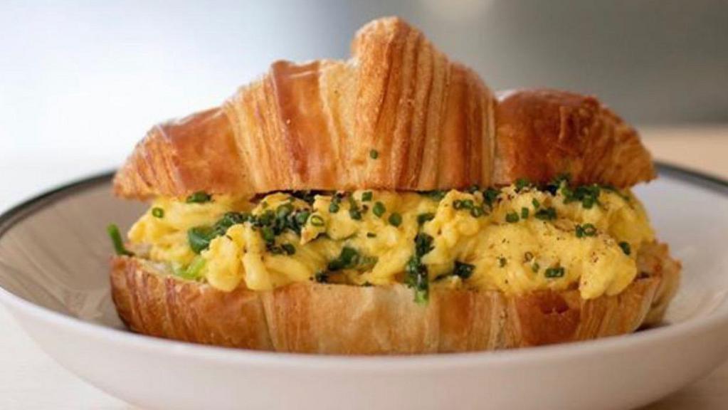 Croissant Sandwich · Croissant with soft scrambled cage-free eggs and cheddar.