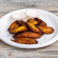Plantains · Fried sliced plantains served with crema.