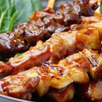 Yakitori · Skewered chicken barbecued with delicious teriyaki sauce.