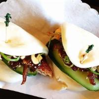 Crispy Duck Bao (2 Pieces) · Grill crispy roasted duck with cucumber and scallion.