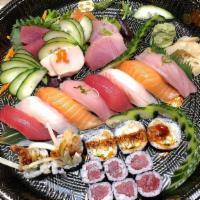 Samurai Sushi-A (For 2) · Eight pieces sushi, eight pieces sashimi, tuna roll, and shrimp tempura roll.