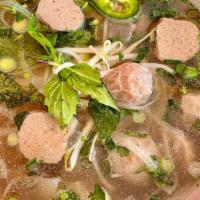 Meatballs Pho · Beef broth with rice noodles and beef meatballs. Garnished with onions, cilantro, green onio...