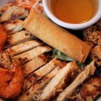 Noodles With Chicken, Shrimp & Eggroll Bowl · Vermicelli rice noodles with grilled chicken and shrimp and a Vietnamese egg roll served wit...