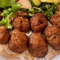 N8 Noodles With Pork Meatballs · Vermicelli rice noodles with shredded lettuce, mint, cilantro, bean sprouts, pickled radish ...