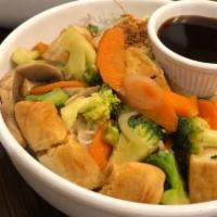 Noodles With Tofu & Vegetables · Vermicelli rice noodles with strips of tofu, mushrooms, bok choy, broccoli, carrots, onions,...