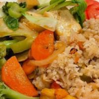 Tofu & Vegetables With Rice · Vegetable rice plate. Sautéed tofu, mushrooms, bok choy, broccoli, carrots, onions, crushed ...