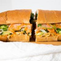 Vegetarian Sandwich · Tofu, carrot, and jicama. Served on a light, crispy baguette with mayo, cucumber, jalapeño, ...