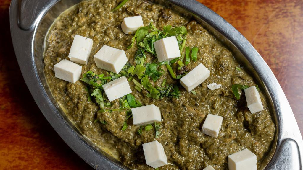 Sag Paneer · Spinach and homemade cheese cubes cooked in flavorful spices.