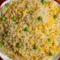 Rice Pullao · Lightly fried rice with peas and a touch of cumin seeds.