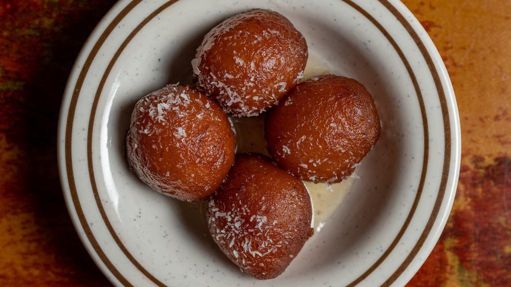Gulab Jaman · Juicy deep fried cheese ball dipped in syrup.