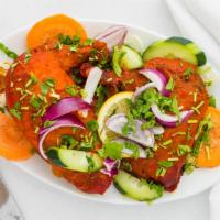 Tandoori Chicken · Chicken marinated with spicy yogurt and cooked in clay oven.