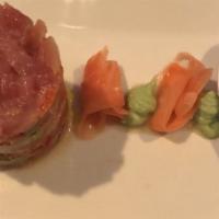 Ahi Tuna Tower  · Sushi grade tuna, avocado, sweet red pepper, tomato, wasabi, pickled ginger, soy.