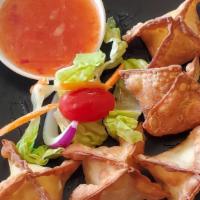 Crab Rangoon · (Crab & cream cheese-filled wontons). A mixture of imitation crab, cream cheese and seasonin...