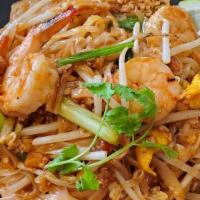Pad Thai · Gluten-free. Sautéed thin rice noodles with egg, onions, bean curd, bean sprouts, and ground...