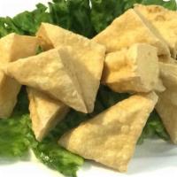 Tofu Triangles · Soy sauce, gluten, wheat. Fried tofu /sweet chili dip/ ground peanut