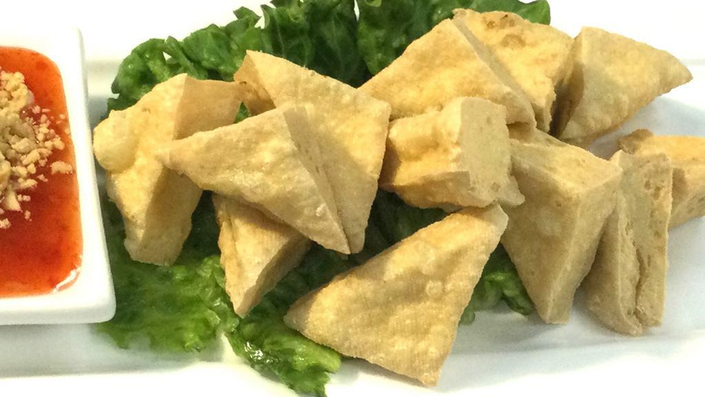 Tofu Triangles · Soy sauce, gluten, wheat. Fried tofu /sweet chili dip/ ground peanut