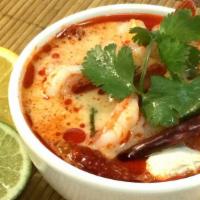 Tom Yum · Soy sauce, gluten, wheat. Spicy and sour soup / lemongrass / chili paste / kaffir lime leave...