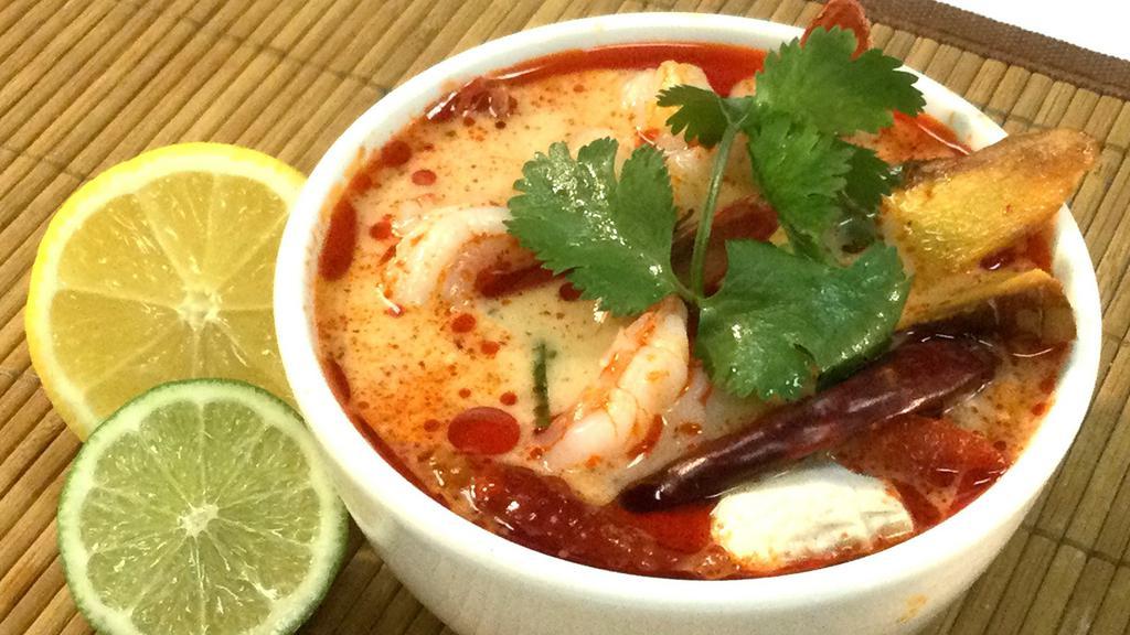 Tom Yum · Soy sauce, gluten, wheat. Spicy and sour soup / lemongrass / chili paste / kaffir lime leaves / galangal / mushroom / lime juice /Choice of: tofu, veg, chicken or shrimp(only shrimp add $1)