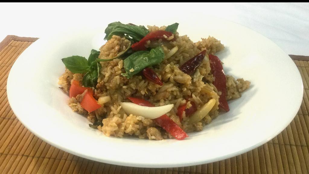 Spicy Basil Fried Rice · Spicy fried rice / basil sauce / basil leaves / onion / egg / fresh bell pepper 
Choice of; tofu, veg, chicken, beef or shrimp (only shrimp add $2.00)