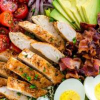 Cobb Salad · Romaine lettuce, tomato, cucumber, oiled egg, grilled chicken, avocado, Gorgonzola & bacon.