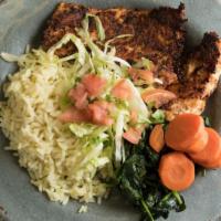 Cajun Dinner · Grilled Cajun chicken served with rice and steamed vegetables.