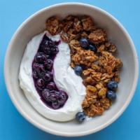 Granola + Yogurt · House made granola, Greek yogurt and seasonal poached fruits.