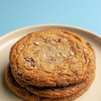 Chocolate Chip Cookie · Classic chocolate chip with crispy edges and a chewy center. Topped with fleur de sel.