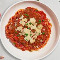 Bangin' Bolognese · Ground beef cooked in spicy marinara sauce and served with spaghetti.  Served with garlic br...