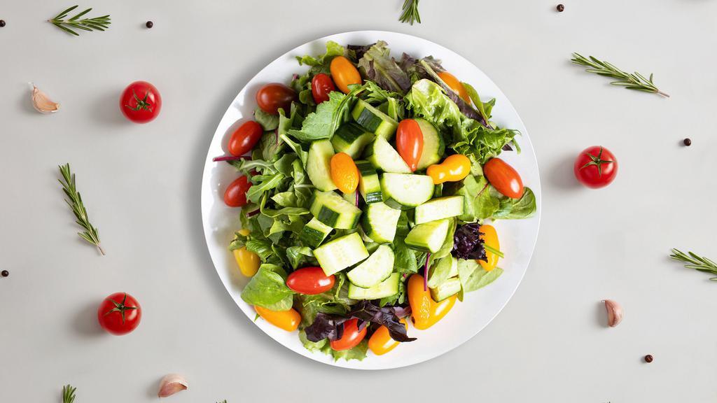 Cellar Salad · Lettuce, cherry tomatoes, carrots, onions dressed with lemon juice & olive oil.