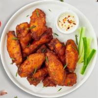 Fried Flying Wings · Fresh crispy chicken wings. Five pieces.