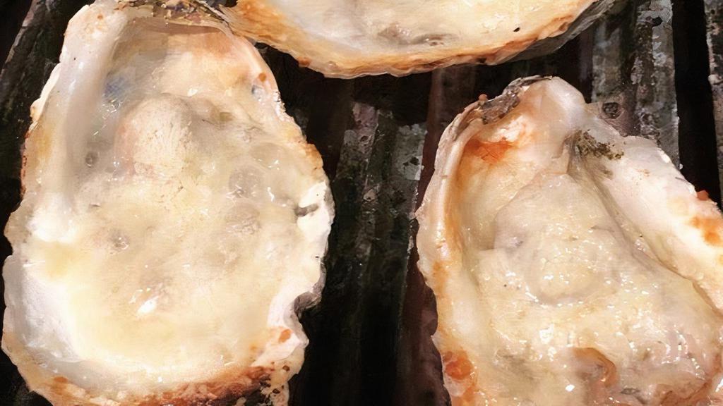 Grilled Oysters · 6 oysters on the 1/2 shell grilled in butter herbs and parmesan cheese.
