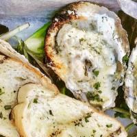 Grilled Oysters · butter, herbs & parmesan cheese