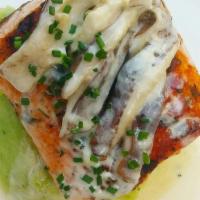 Grilled Atlantic Salmon · chive mashed potatoes, shitake mushrooms and cream sauce.