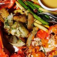 Broiled Whole Lobster  · 1.25lbs broiled lobster, served with rosemary potatoes, green beans, melted butter.