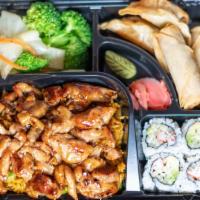 Chicken Bento · Served with mixed vegetable, white rice, plus 4 pcs California Roll, 2 pcs chicken dumplings...