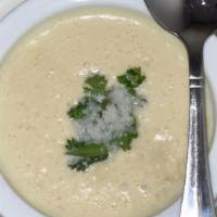 Coconut Chicken Soup · Diced chicken smothered in chicken broth and flavored with coconut milk.