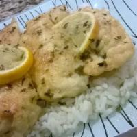 Lemon Chicken · Breast of chicken sautéed with white wine, lemon sauce, and fried plantains.