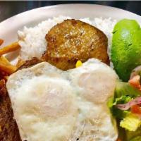 Churrasco Ecuatoriano · Slice beef, eggs, avocado, french fries, and salad, served with white rice.