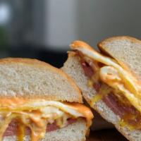  Ham Egg And Cheese Sandwich  · Slice  ham, 2 egg, melted American  cheese, salt, pepper and ketchup.