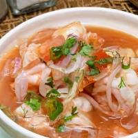 Shrimp Ceviche · Shrimp marinated, mixed with fresh tomatoes, onions, lemon juice and secret ingredients. Ser...