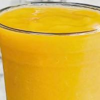 Merry Mango Smoothie · Peach, mango, and fruit juice. Fresh and smooth served in a glass size of your choosing.