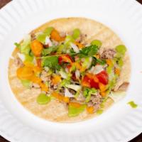 Duck Taco · Soft Corn Tortilla, Braised Duck, Pico de Gallo, Lettuce, Habanero Sauce, Avocado Sauce