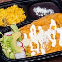 Chiles Rellenos · Two Poblano Peppers Stuffed with Melted Cheese, Tomato Sauce, Rice and Beans