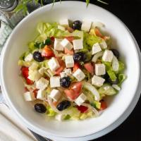 Greek Salad · Lettuce, tomato, cucumber, black olive, feta cheese, onion, bell pepper.